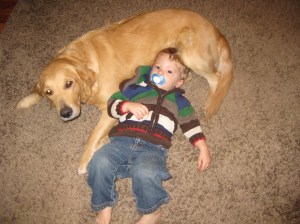 Our son laying on Lilly